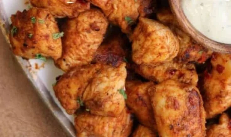 Healthy low-carb buffalo chicken bites served on a platter