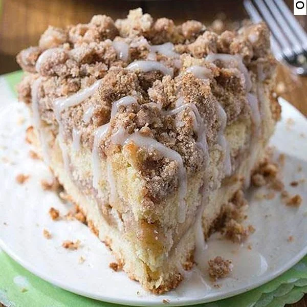 Delicious homemade Apple Crumb Cake with a buttery crumb topping and fresh apples.
