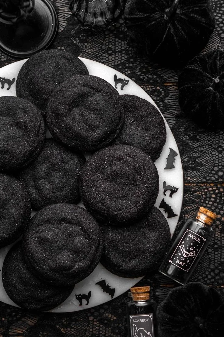 Delicious Black Velvet Cheesecake Cookies topped with cream cheese frosting.
