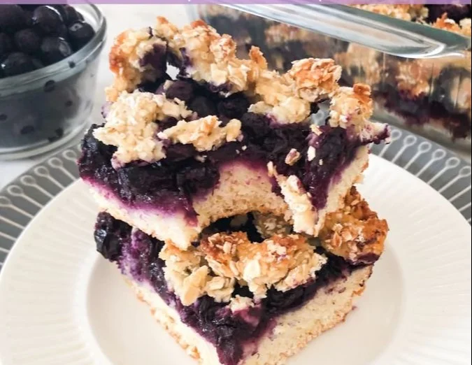 Homemade blueberry oat crumble bars with a golden topping