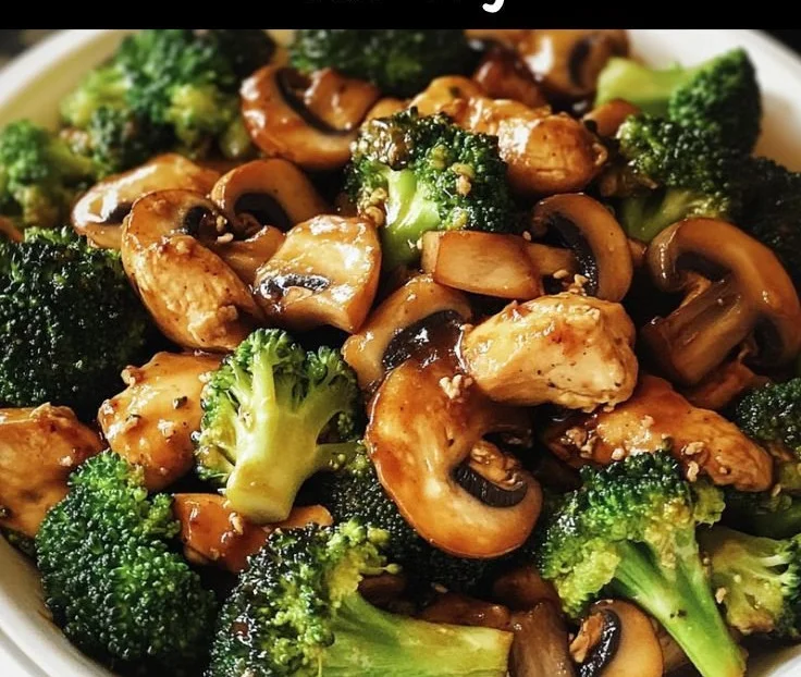 Chicken stir-fry with broccoli and mushrooms in a colorful bowl