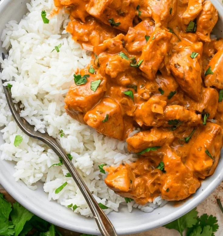 Delicious Coconut Chicken Rice Bowl with vibrant vegetables and coconut sauce