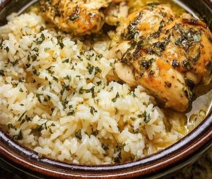 Delicious lemon herb chicken served with rice for a cozy family dinner