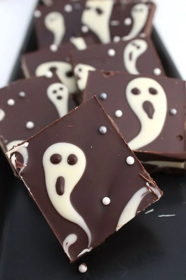 Ghastly candy bark Halloween treat with ghost chocolate design