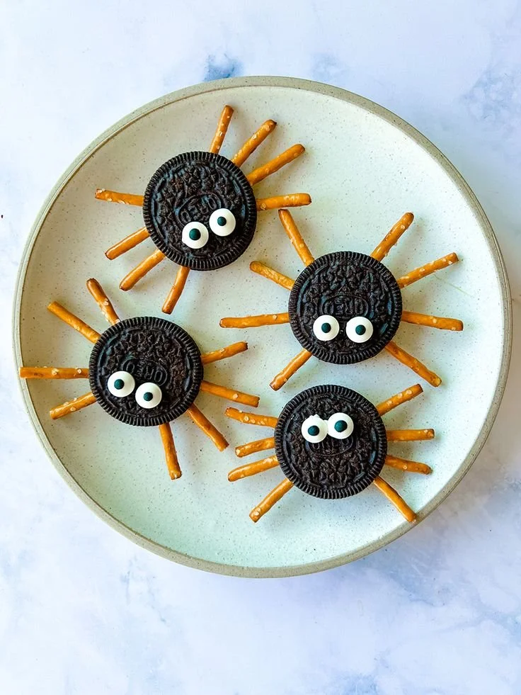 Homemade Halloween spiders made from craft materials as spooky decorations