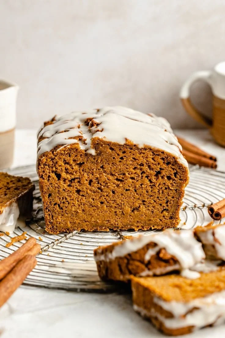 Moist and delicious healthy pumpkin bread on a wooden table