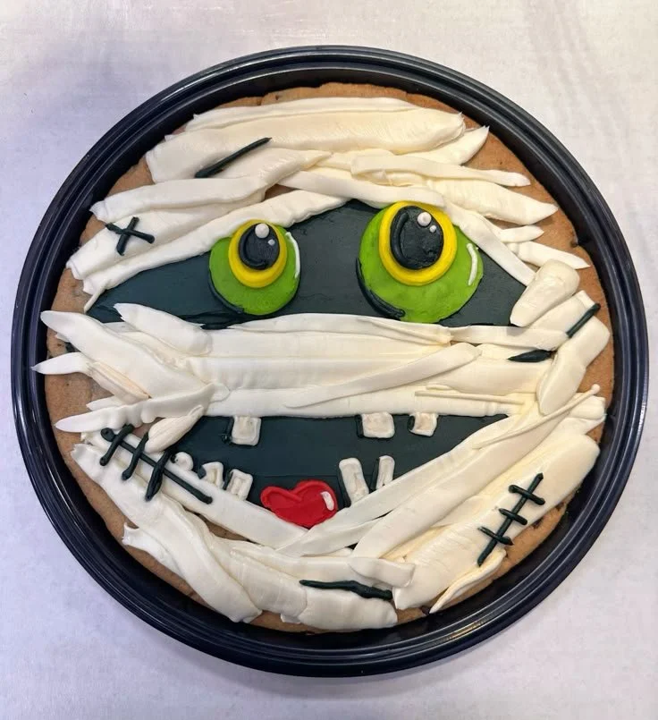 Delicious monster mummy cookies decorated for Halloween celebration