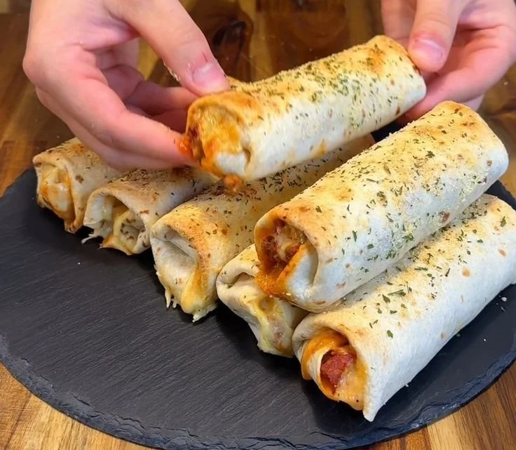Plate of delicious Pepperoni Pizza Rolls ready to be enjoyed.