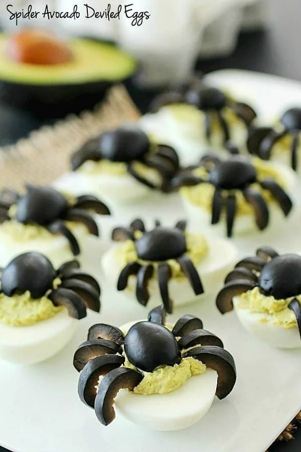 Delicious spidered boiled eggs presented on a plate with garnishes