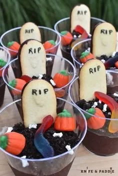 Spooky Halloween dirt cups with chocolate pudding and gummy worms