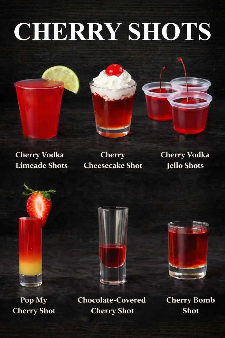 Delicious cherry shots in colorful glasses ready to be served.
