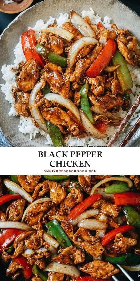 Plate of flavorful black pepper chicken garnished with herbs.