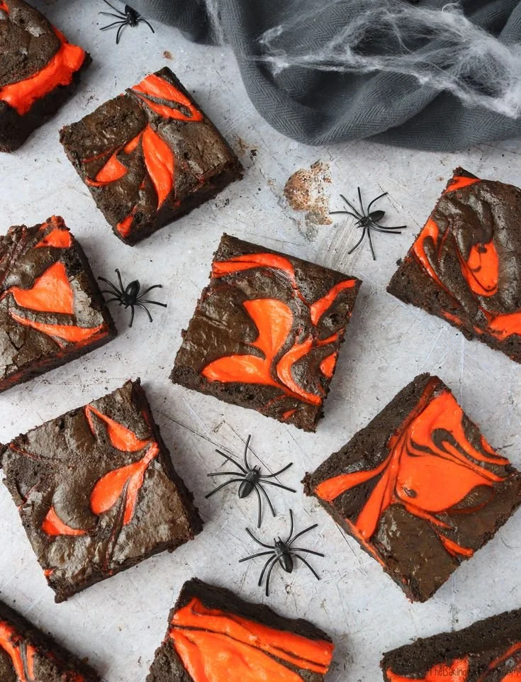 Halloween Cheesecake Brownies with chocolate and cream cheese swirl