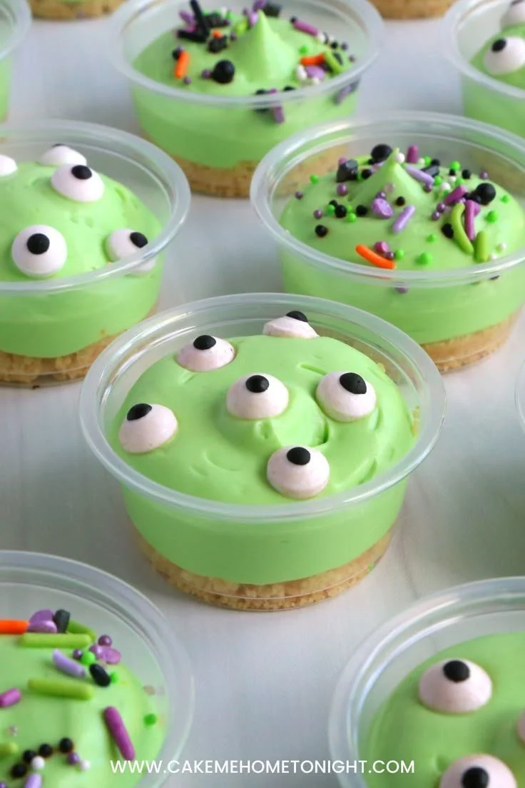 Colorful Halloween dessert cups filled with treats for festive celebrations.