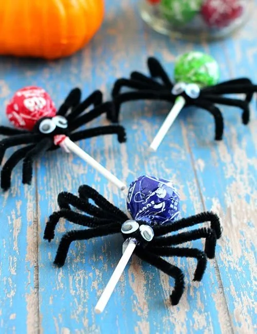Cute spooky spider lollipops crafted for Halloween treats