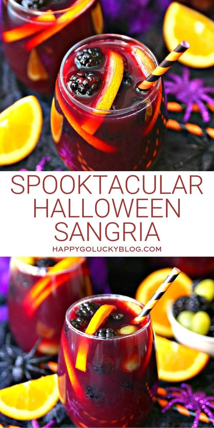 Glass of Halloween Sangria with spooky decorations and fruits