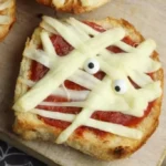 spooky mummy pizza for a fun halloween treat ha 2026 08 06 192232 683x1024 1