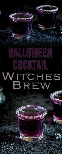 Witches Brew Halloween Cocktail in a glass, purple drink with spooky garnishes